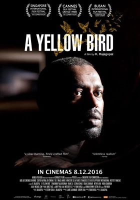 Film poster for "A Yellow Bird" directed by K Rajagopal, featuring a close-up of a man's face and festival accolades.