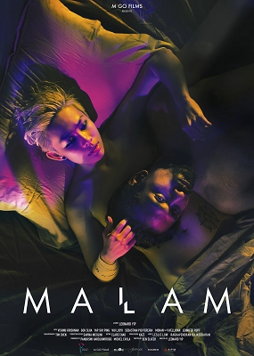 Official film poster for "Malam" featuring two figures in dramatic lighting with vibrant purple and yellow hues.