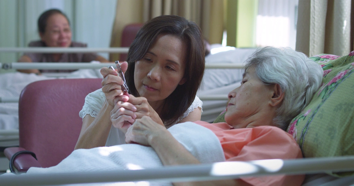 A scene from the Singaporean film 'Sandcastle', showing a contemplative moment in the coming-of-age story.