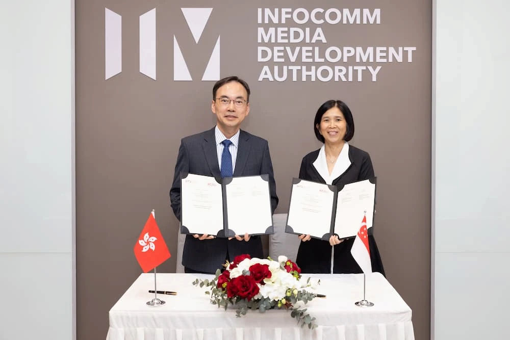 Mr Chaucer Leung (left) and Ms Aileen Chia (right) signed a MOU